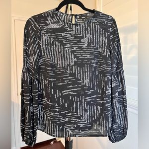 Black and white blouse.